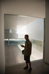 Fototapeta premium Man checking cell phone