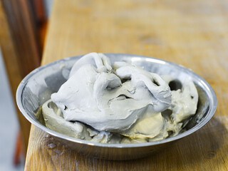 making pottery of different shape on pottery wheel