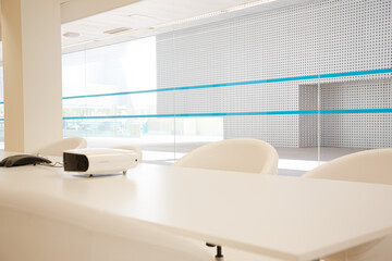 Desk and chairs in conference room