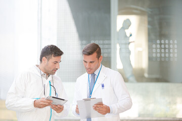 Scientists talking in laboratory