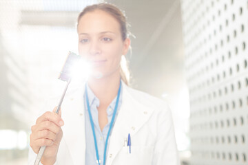 Engineer examining circuit board