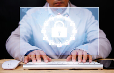 Businessman working computer virtual screening with cyber security and data protection, Padlock protecting business and financial data with virtual network connection