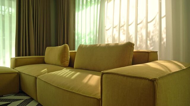 empty golden mustard sofa in living room