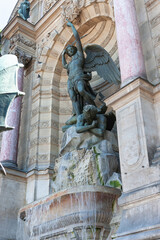 A fragment of the fountain of the Archangel Michael. Paris, France