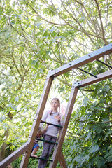 Obraz premium Children playing together on playset