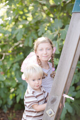 Fototapeta premium Children playing together on playset