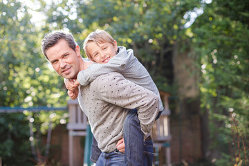 Fototapeta premium Father and son playing outdoors