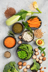Natural sources of plant protein on light background.