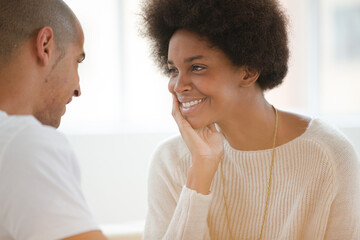 Couple talking indoors