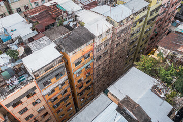 Amazing Colorful messy rooftop on dense residential house in Kowloon, Hong Kong
