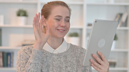 Woman doing Video Chat on Tablet
