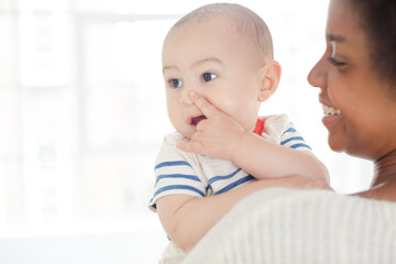 Mother holding baby boy