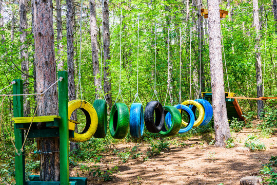 Old painted car tires at the obstacle course