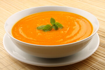 Homemade delicious vegan diet meal- fresh organic pumpkin cream soup.