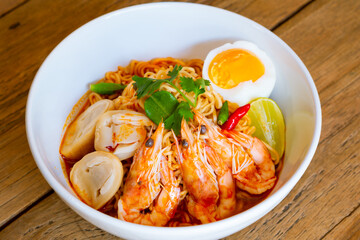 Thai food noodle close up instant noodle Tom Yum Goong flavors with prawn