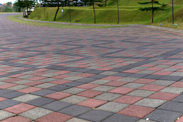 Paving stones. Concept of laying paving slabs and pavers. Paving stones. Concrete pavement blocks. can be used as background and wallpaper