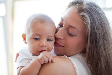 Mother holding baby boy