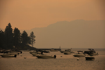 Smoke from a wildfire covers Lake Tahoe, California, USA.