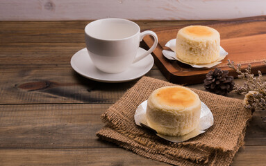 Fototapeta na wymiar Cheesecake on wood background, dessert 