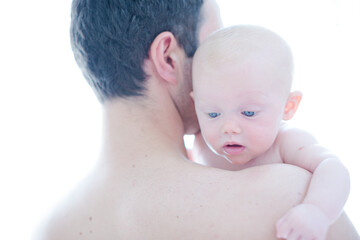 Father holding baby girl