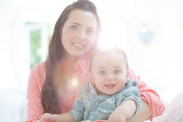 Mother holding baby boy