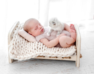Newborn with kittens © tan4ikk