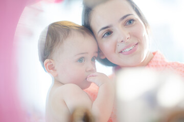 Mother holding baby boy