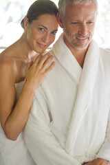 Smiling couple hugging