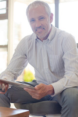 Fototapeta premium Businessman using digital tablet