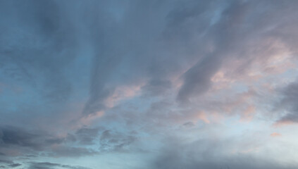 Fototapeta premium Rain clouds in the sky at sunset