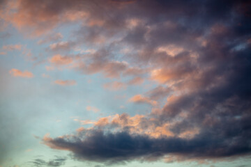 Rain clouds in the sky at sunset