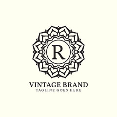 luxurious mandala vintage letter R vector logo design
