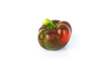 Raw bell pepper on the white glossy background