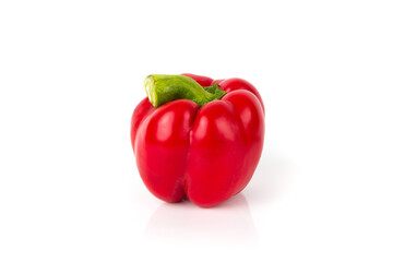 Raw bell pepper on the white glossy background