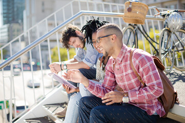 Friends talking on city street