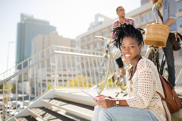 Woman posing with digital tablet