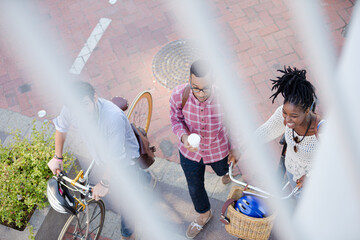 Friends walking on city street