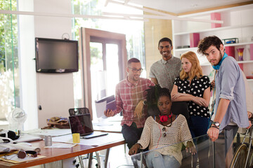 People smiling together in office