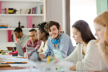 People working at conference table in office