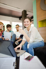 Woman drinking coffee in office