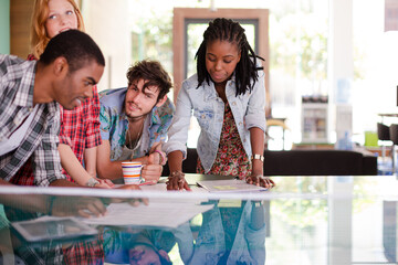 People working together on ping pong table