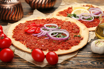 Delicious Turkish pizza on wooden background
