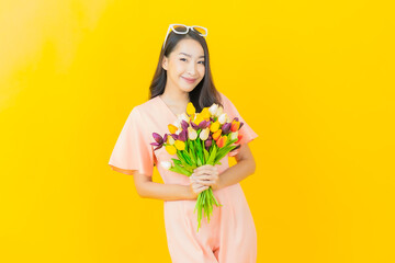 Portrait beautiful young asian woman smile with flower