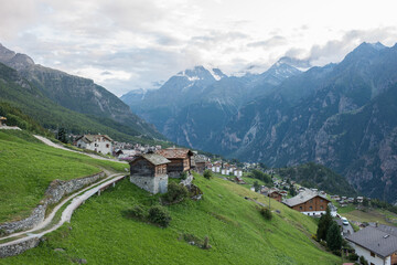 The village of “Grächen” in Valais in Switzerland with its typical houses, after sunset.