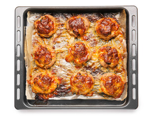 Baking tray with delicious minced meat boats, mushrooms and melted cheese on white background