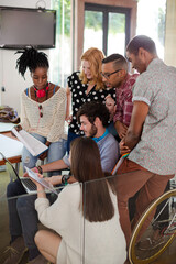 People working on laptops in office