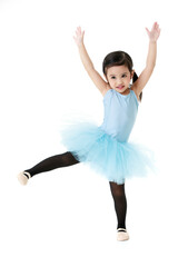 Obraz premium Portrait isolated studio shot of small pretty Asian preschool pigtails ballerina dancer girl in blue tutu ballet dress black legging standing smiling posing hold hands and leg up on white background