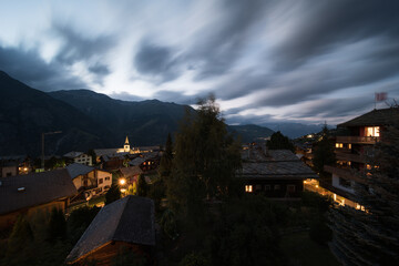 The village of “Grächen” in Valais in Switzerland in the late evening in the dark. 