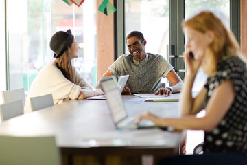 Woman working at conference table in office