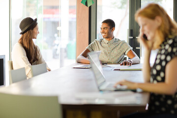 Woman working at conference table in office